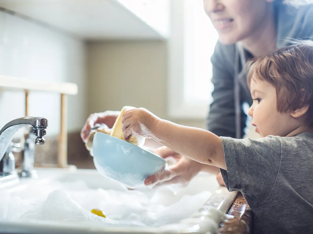 Boy washing up