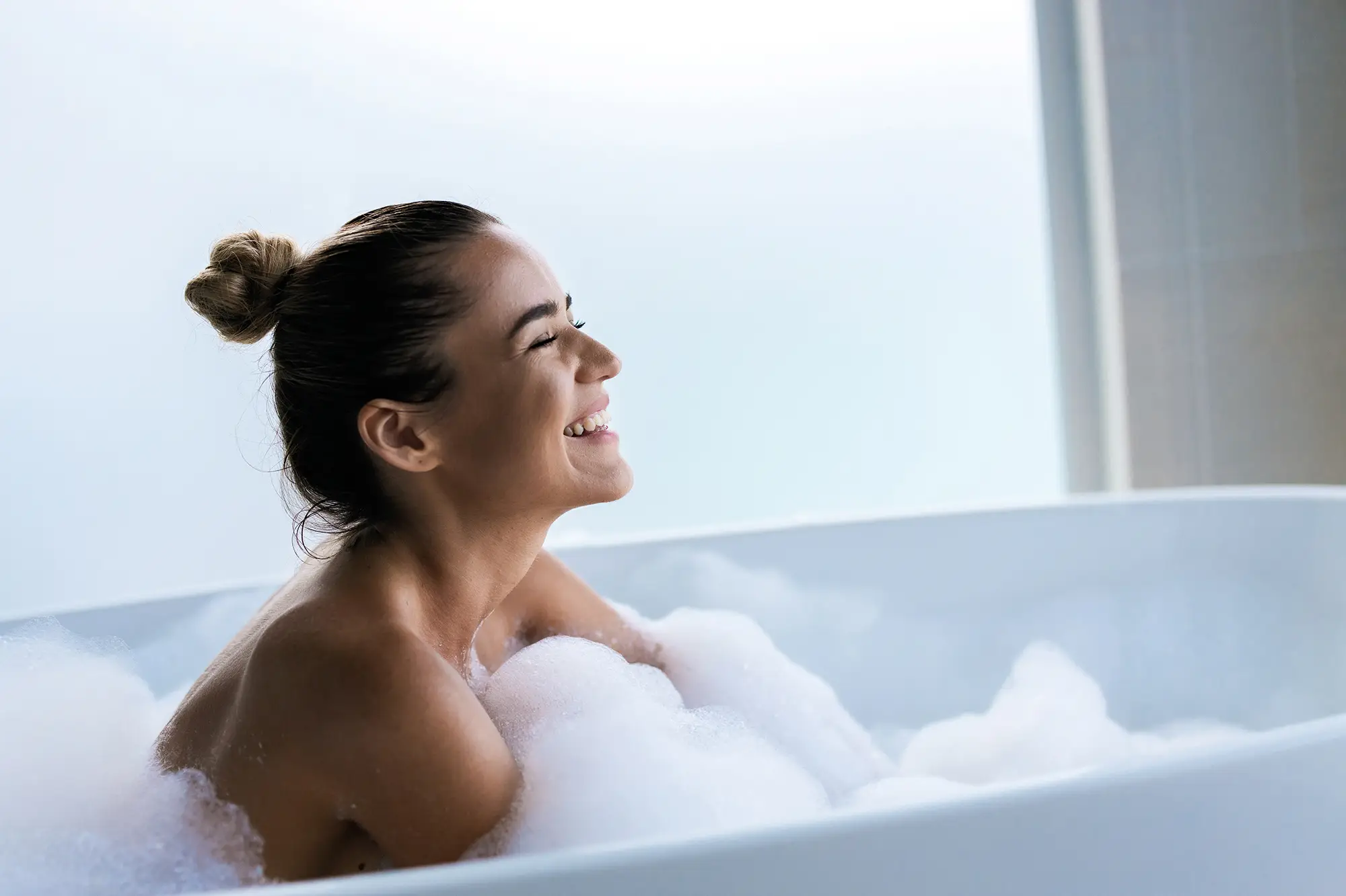 Woman enjoying a bath